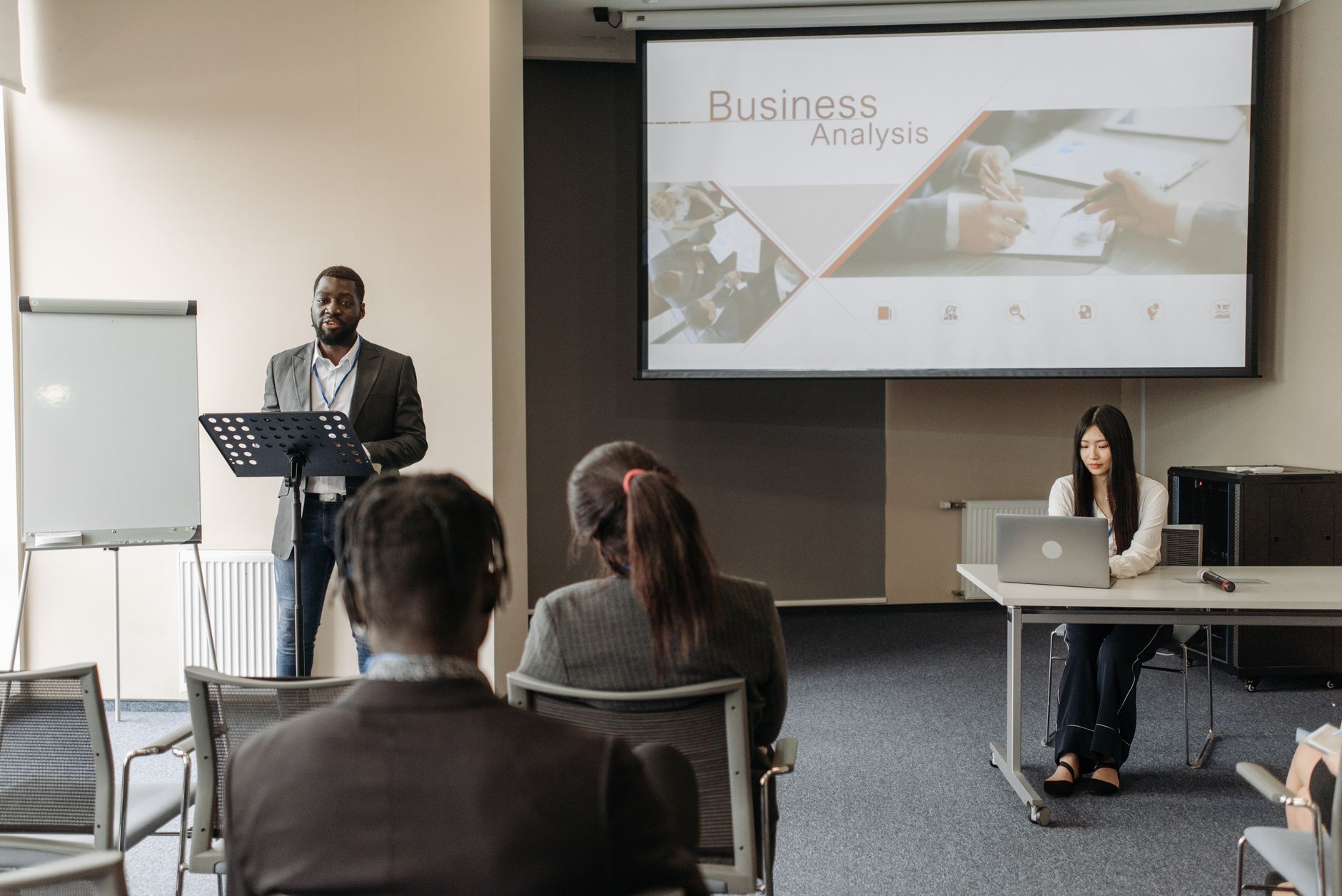 Business seminar with a speaker and audience in a conference room. — Best Tips To Apply For A canada investor visa With Ease!