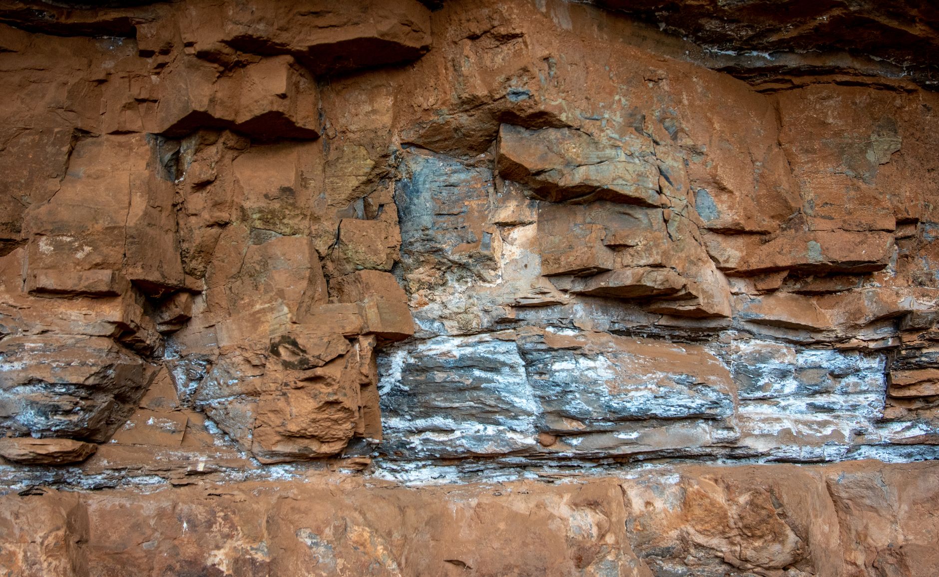 Detailed view of layered rock formations showcasing natural texture and color. — Cannabis light shop, how do I open a legal s