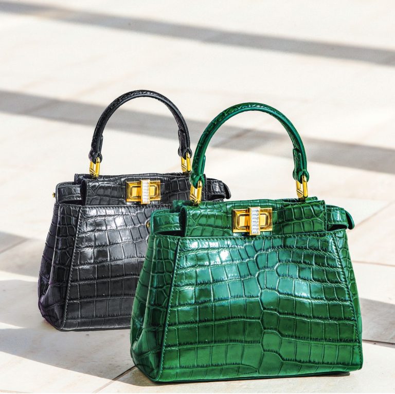 Elevate your style with these exquisite green and black crocodile pattern handbags, perfect for a luxury fashion statement. —