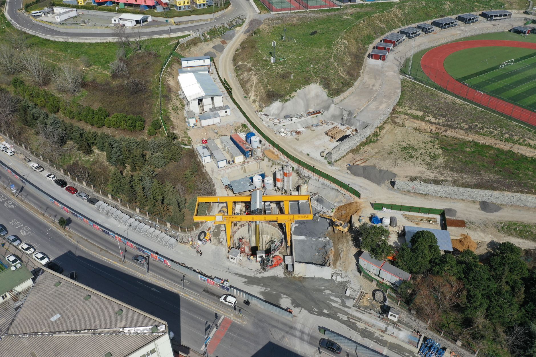 Sunlit aerial view of a construction site in Güngören, İstanbul near a stadium. — Is It Good To Have Plastic Furniture In You
