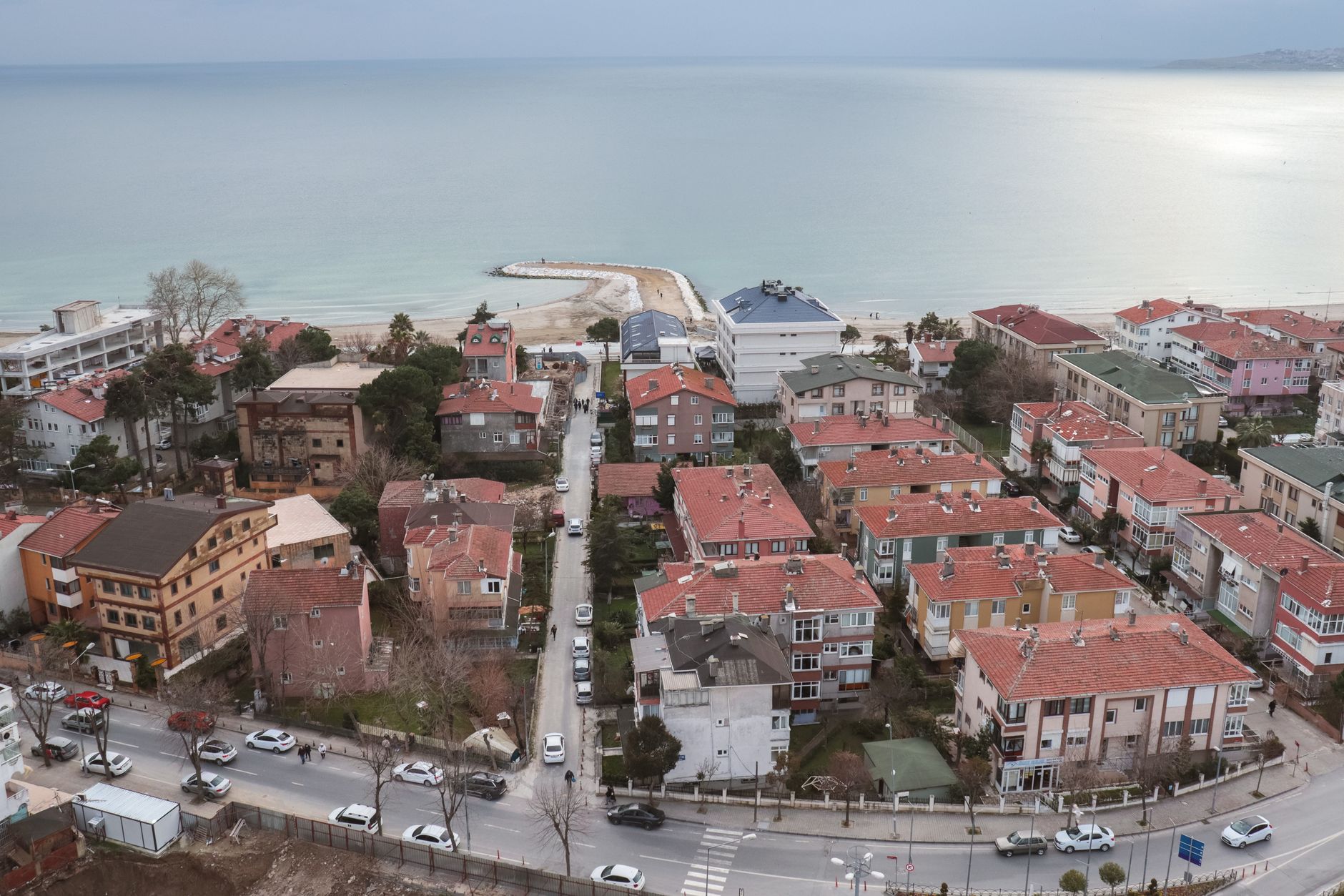 Aerial shot of a picturesque coastal town with red rooftops and a serene ocean view. — Make Money By Playing Free Roulette Ga