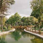Peaceful park scene featuring a serene pond, a wooden bridge, and lush greenery. — Minimum Deposit Casino Review: Quick‑Hit G