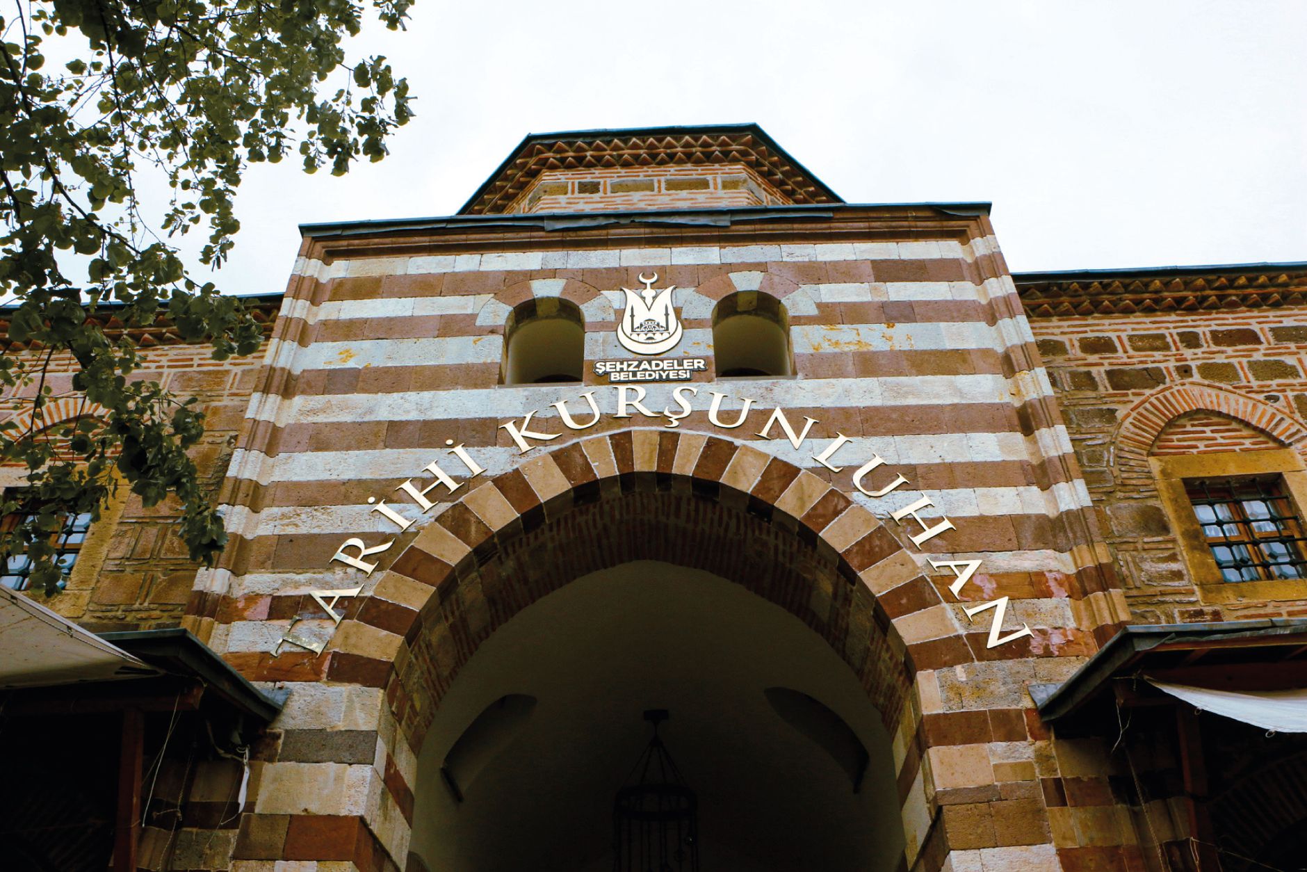 Entrance of the historic Kurşunlu Han in Manisa, Türkiye featuring traditional Ottoman architecture. — Finding Afford