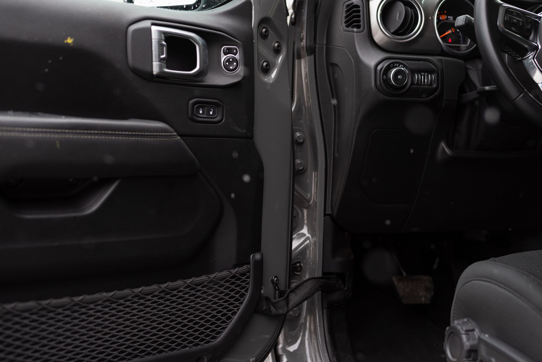 Detailed interior shot of a car showing the door panel and part of the dashboard. — Google Certified Professional Dat