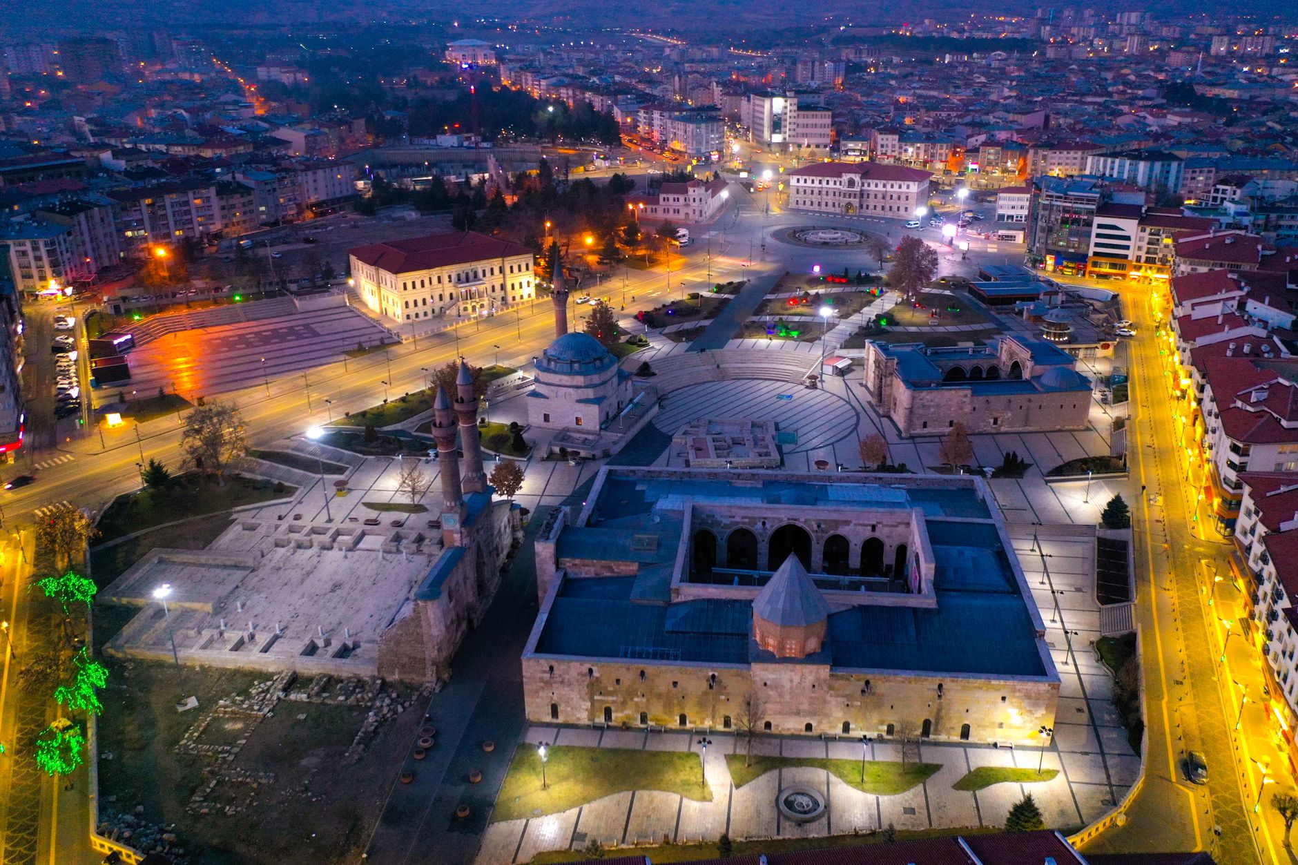 Stunning aerial photograph of Sivas city center illuminated at night, showcasing historic architecture. — Take a Gamb